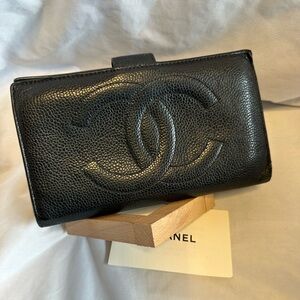 Chanel Black Caviar Long Wallet with kiss lock.